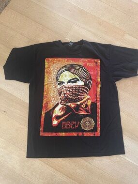 Obey Shepherd Fairy - Black Short Sleeve Tee with Red & Yellow Graphic